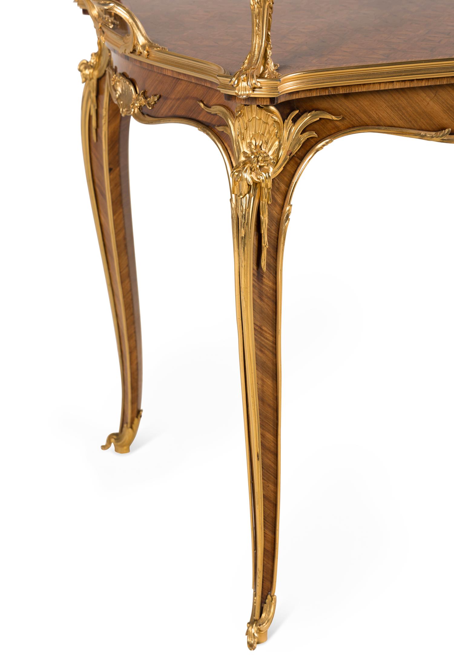 A Louis XV Style Gilt Bronze Mounted Parquetry Table à Thé