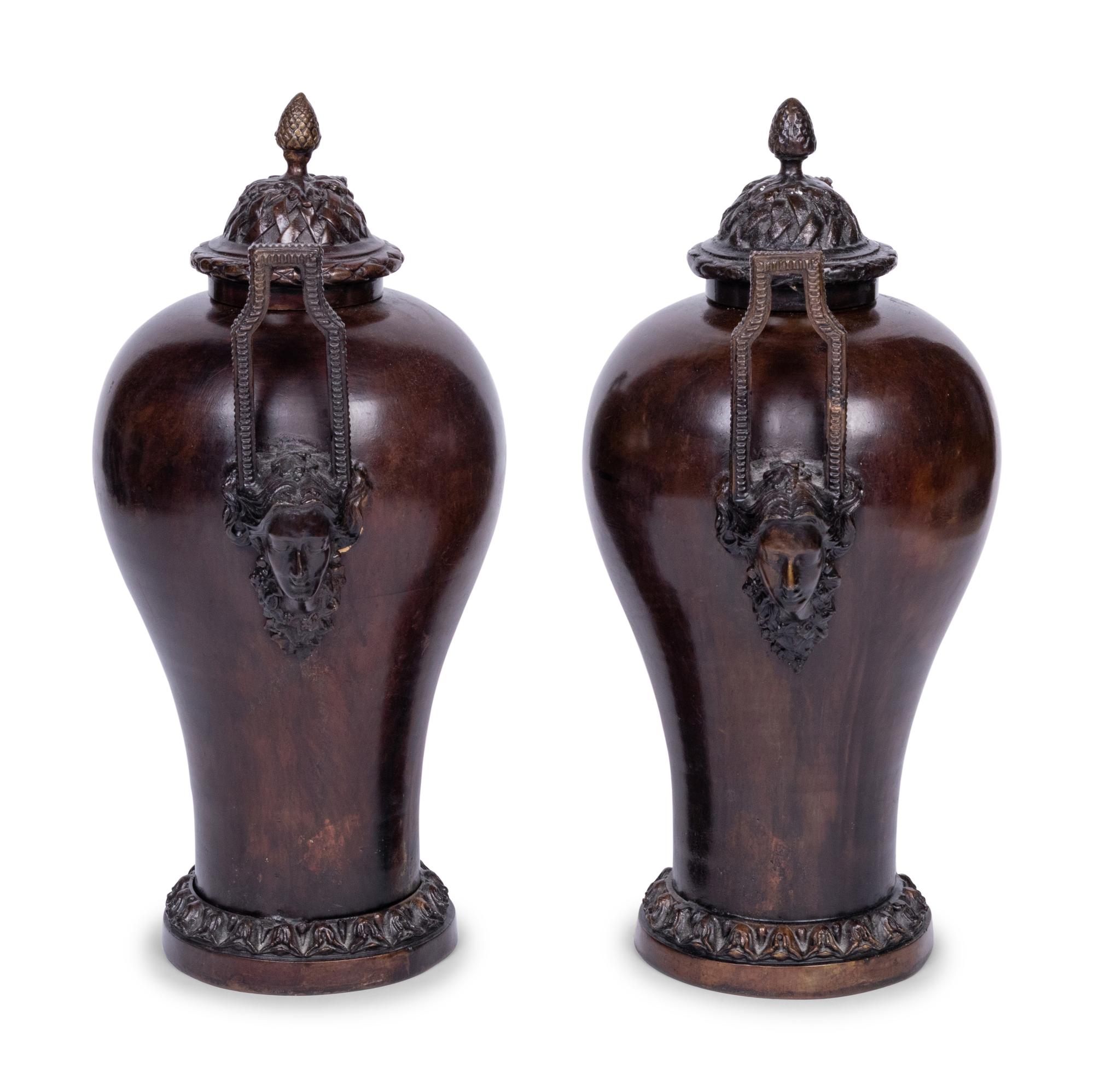 A Pair of Neoclassical Style Patinated Bronze Covered Urns
