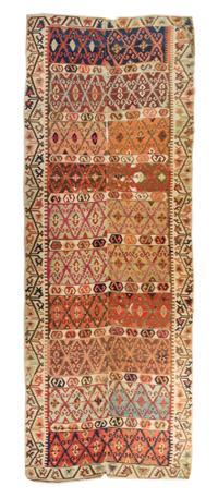 A Kilim Wool Rug 10 feet 3 inches x 4 feet 7 1/2 inches.