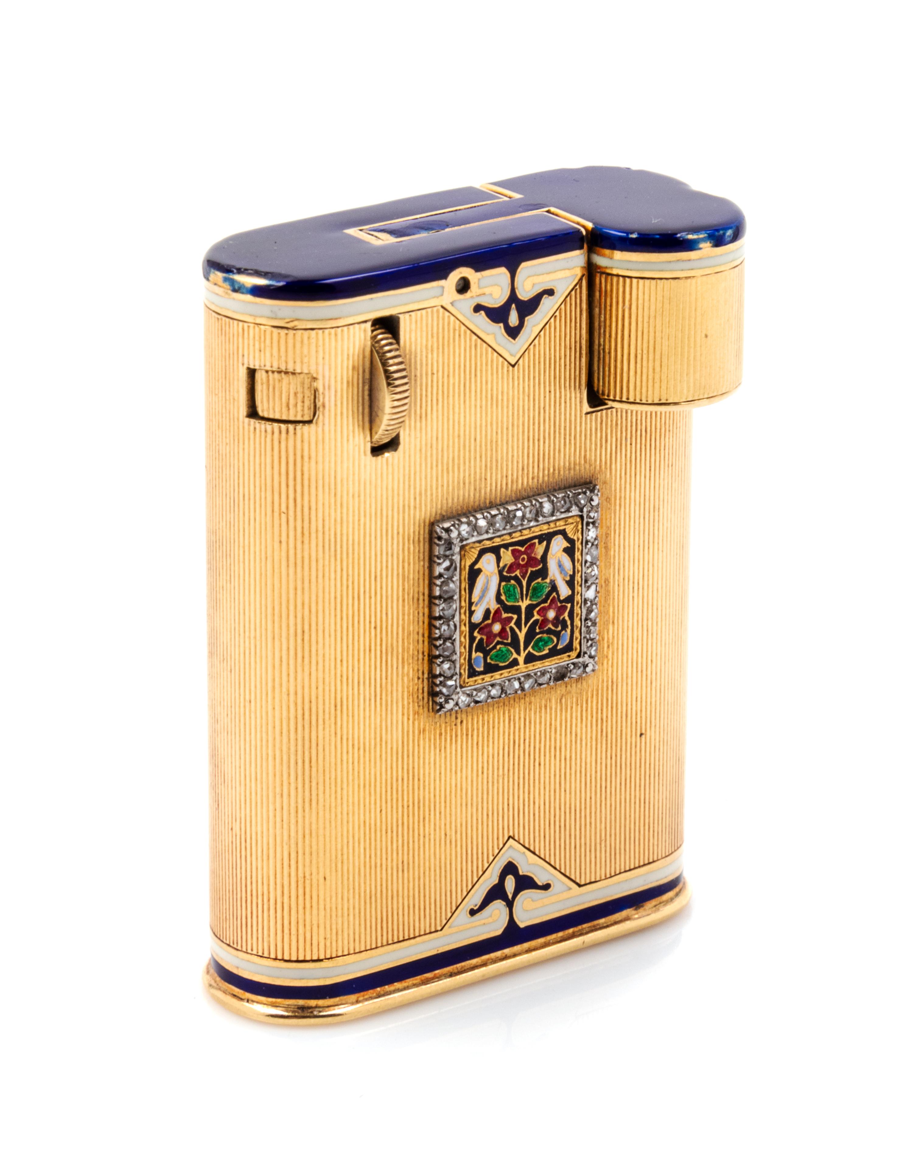 A French Enamel and Diamond Inset Cigarette Lighter, Cartier, Paris, First Half 20th Century, the blue enameled lid opening to a wick a