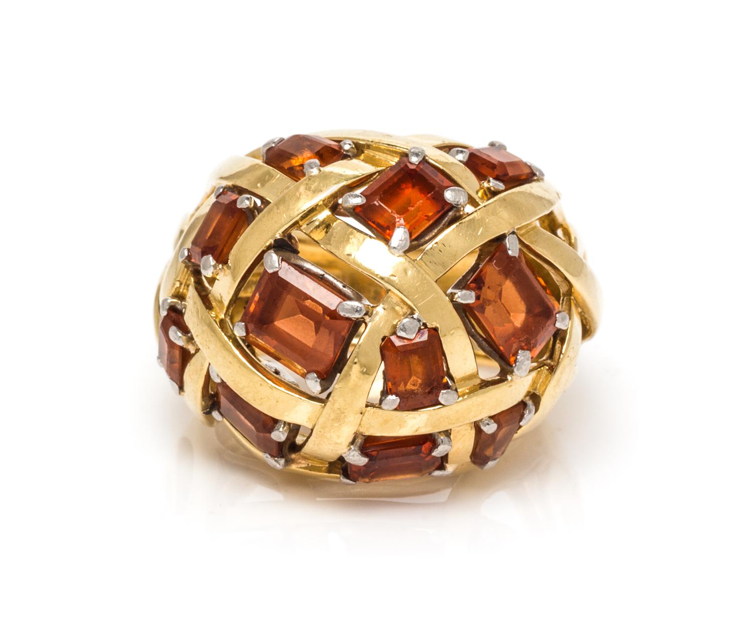 An 18 Karat Yellow Gold, Platinum and Garnet "Dome Of Ribbons" Ring, Schlumberger for Tiffany & Co., 9.90 dwts.