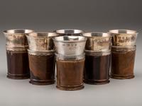 A Silver Mounted Mahogany Pitcher and Six Cups