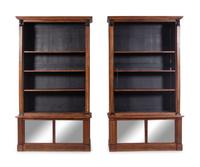 A Pair of Italian Parcel Ebonized Walnut Bookcases