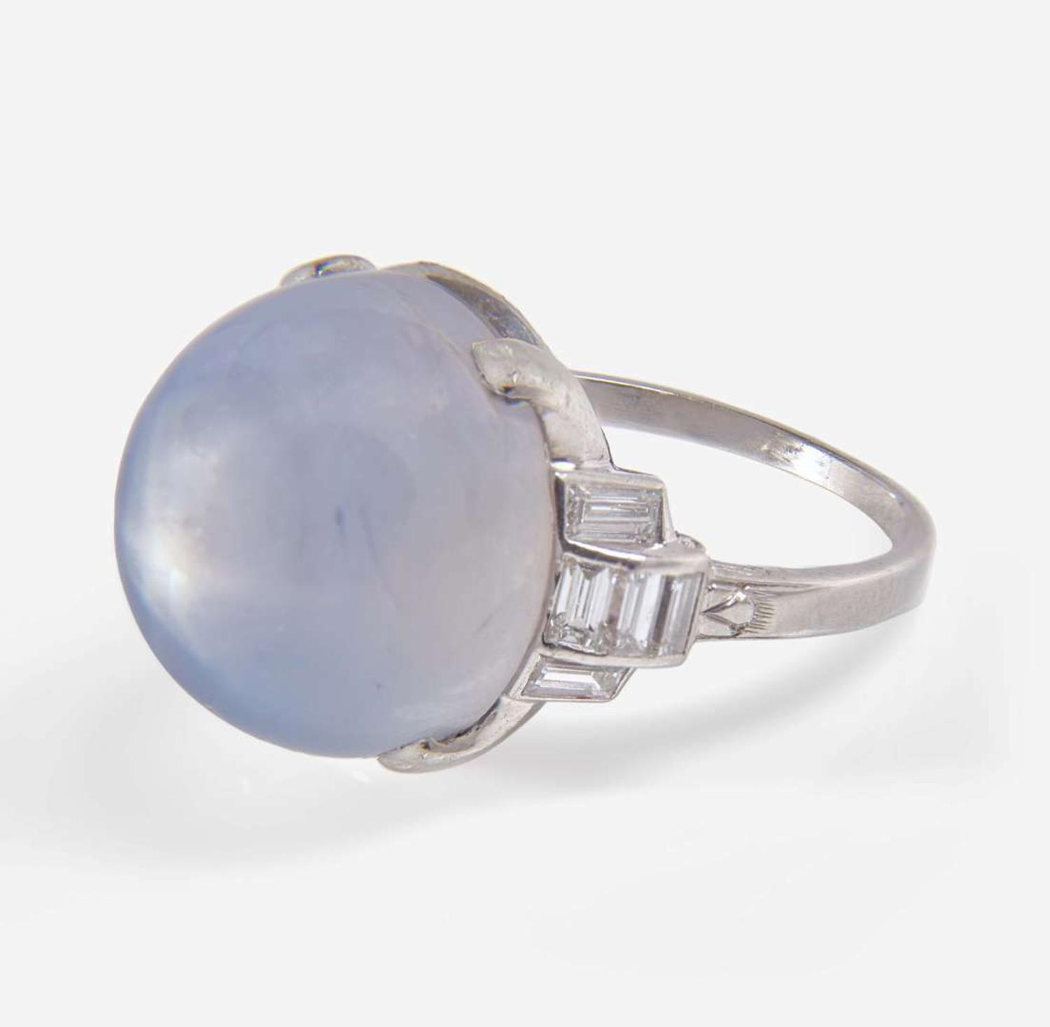 A Platinum, Diamond, and Star Sapphire Ring