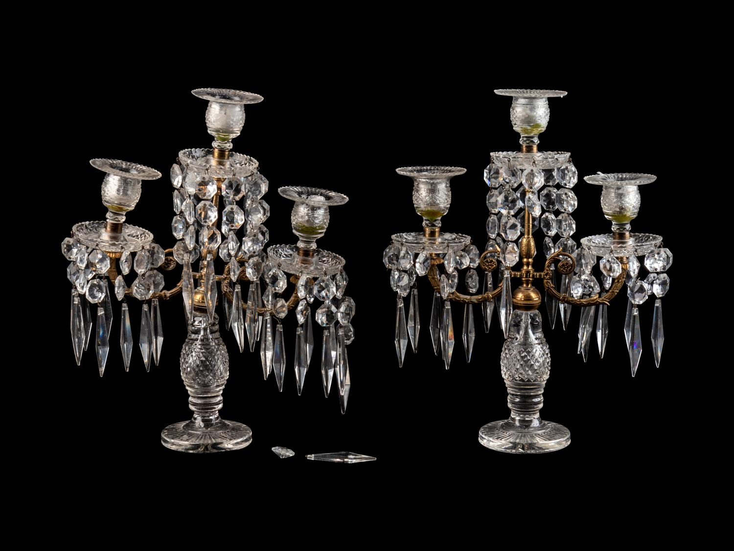 A Pair of Continental Cut Glass and Brass Three-Light Candelabra