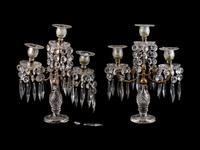 A Pair of Continental Cut Glass and Brass Three-Light Candelabra