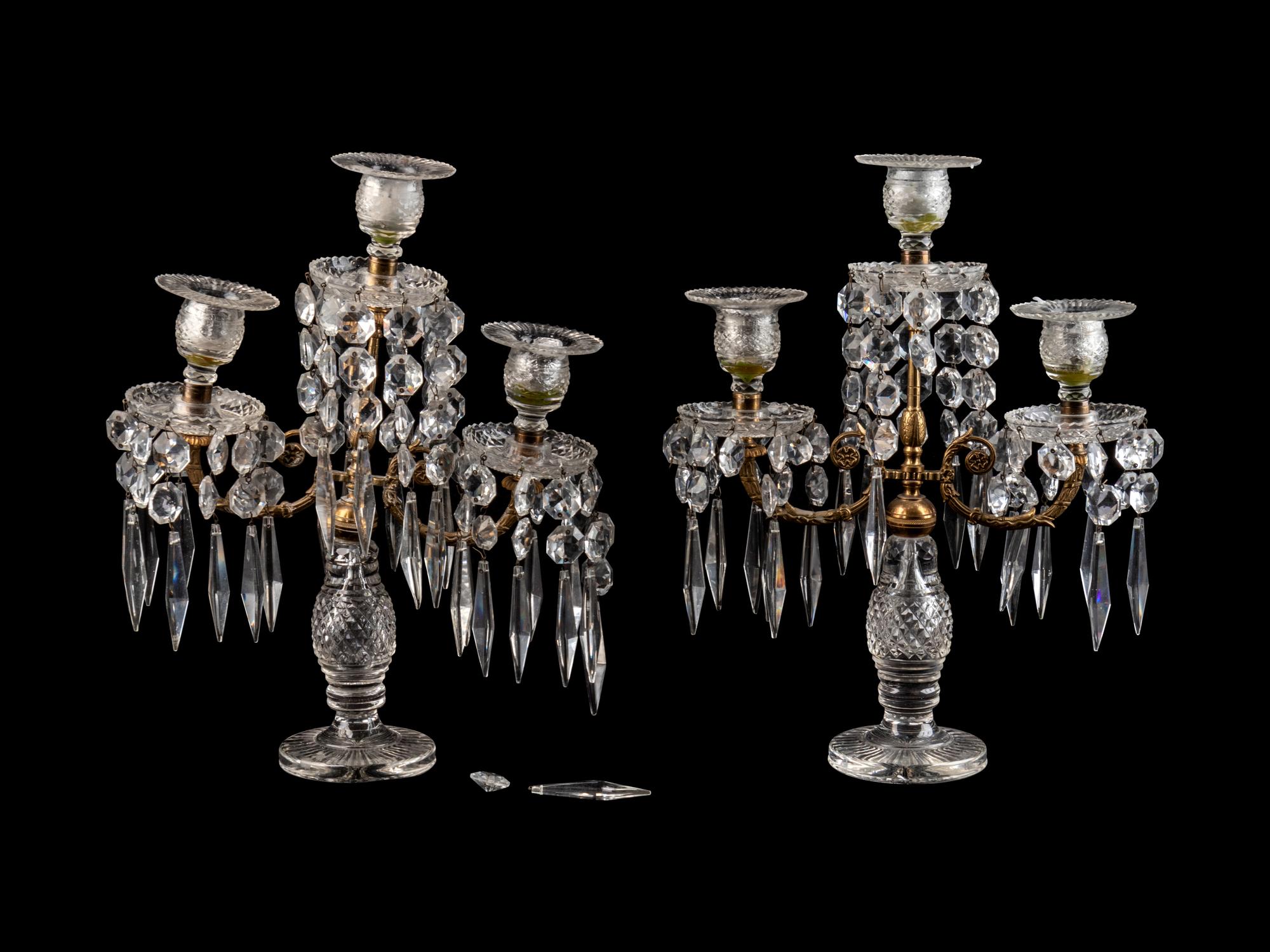 A Pair of Continental Cut Glass and Brass Three-Light Candelabra