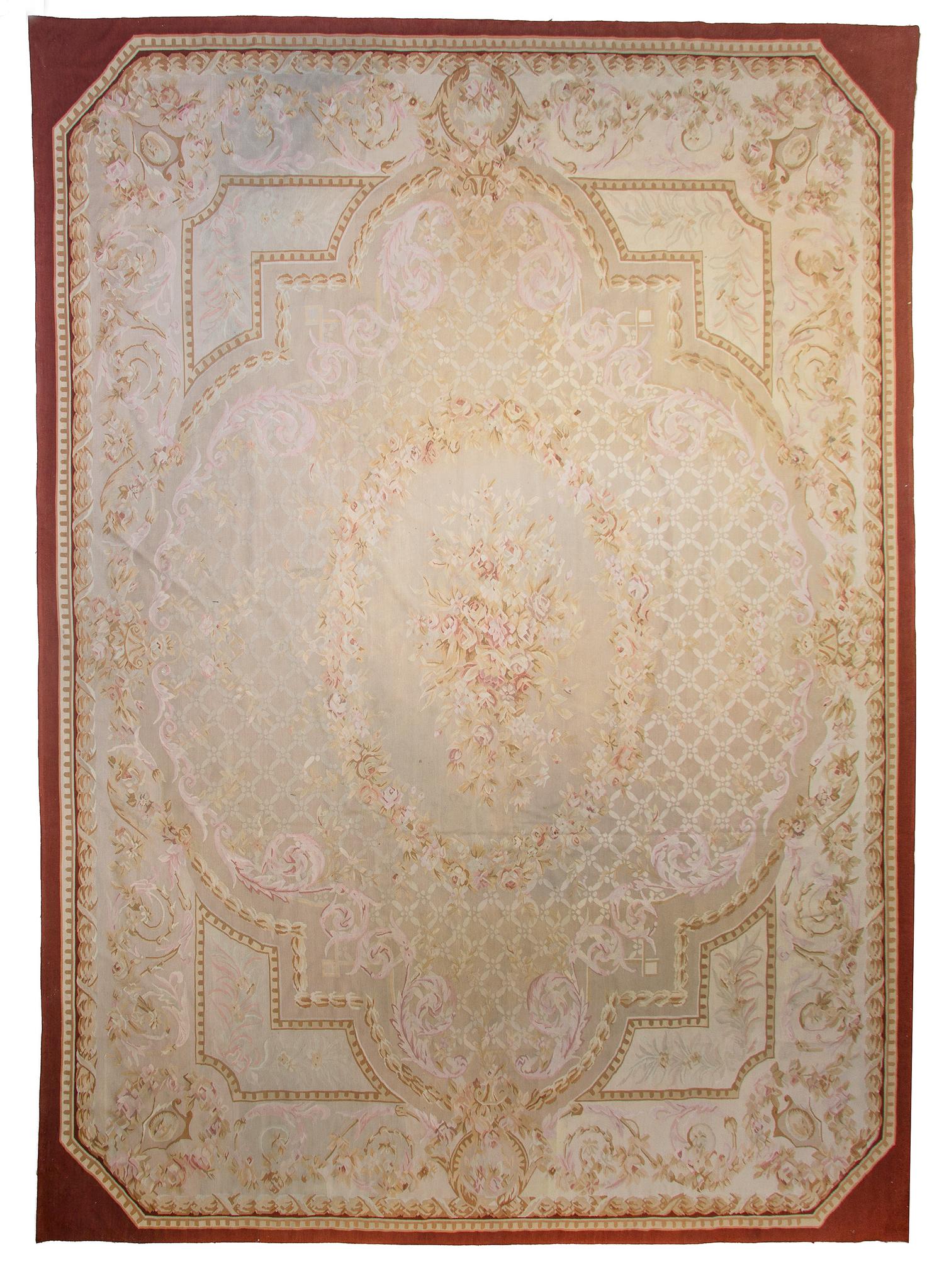 An Aubusson Wool Rug, 15 feet 2 inches x 11 feet 8 inches.