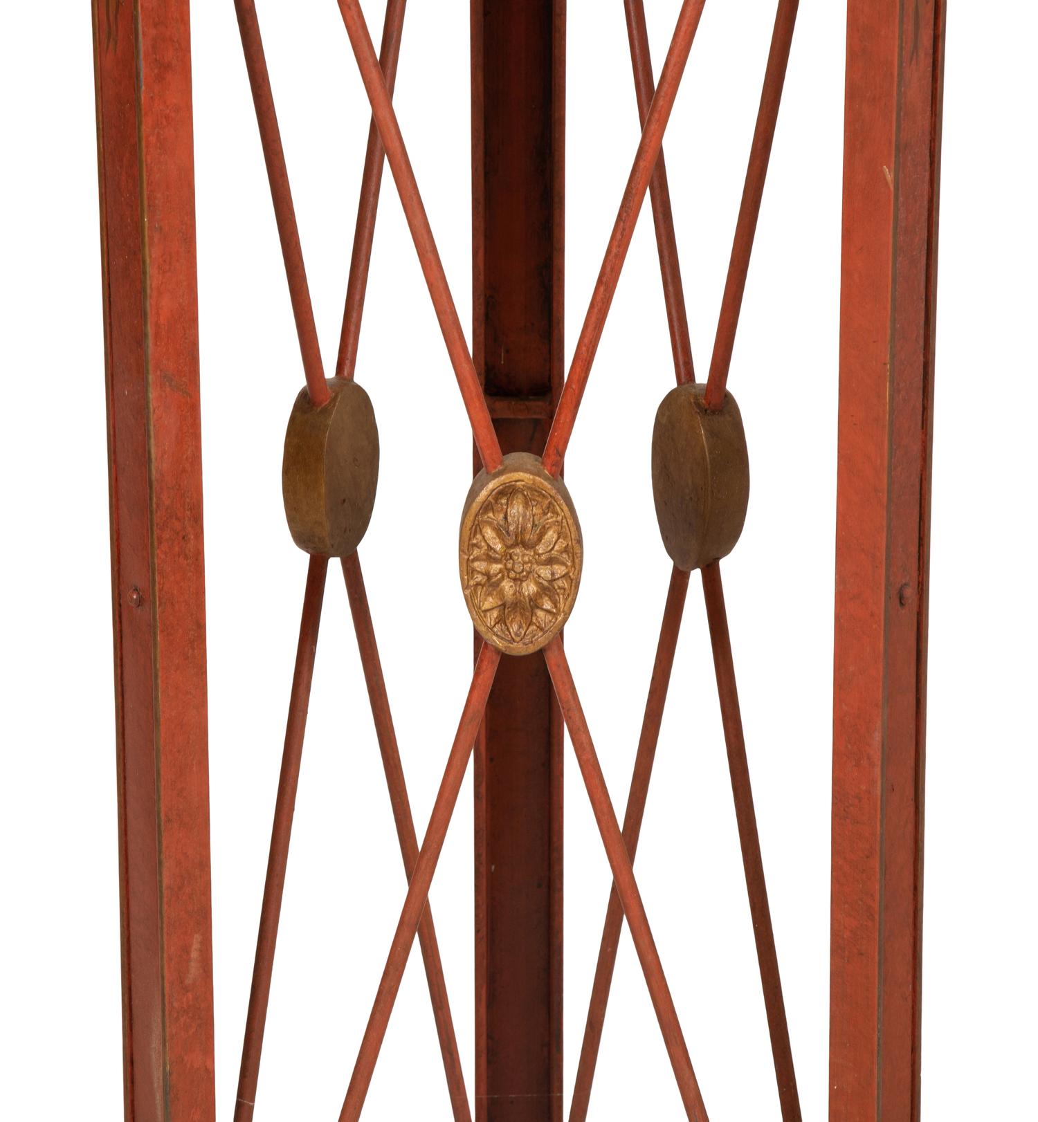 A Pair of Red and Gold Tole Peinte Jardiniere Stands