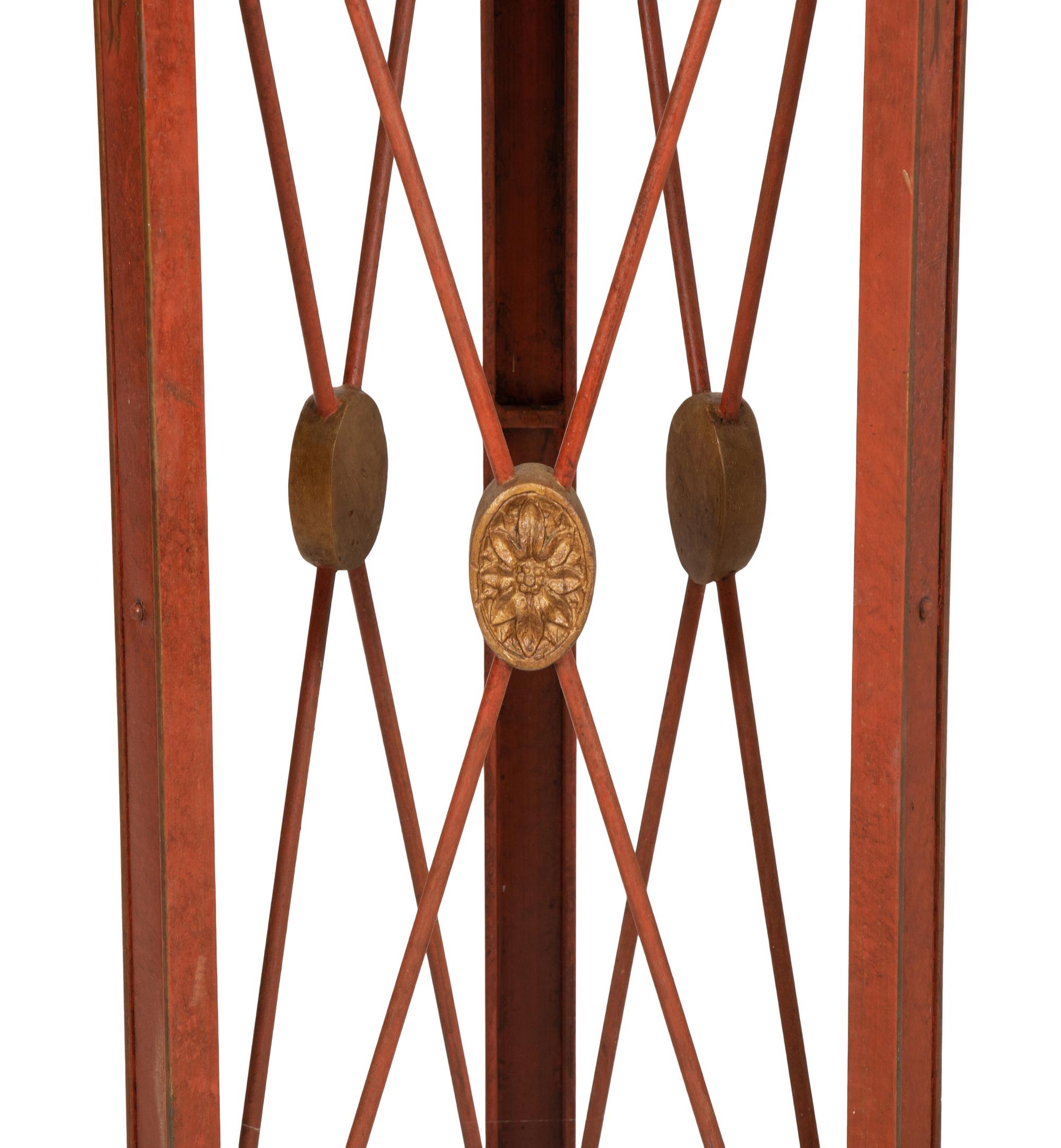 A Pair of Red and Gold Tole Peinte Jardiniere Stands
