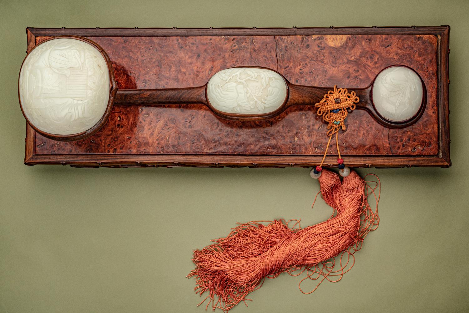 A Large White Jade Inset Hardwood Ruyi Scepter