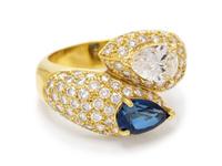 A Vintage 18 Karat Yellow Gold, Sapphire and Diamond Bypass Ring, Cartier,