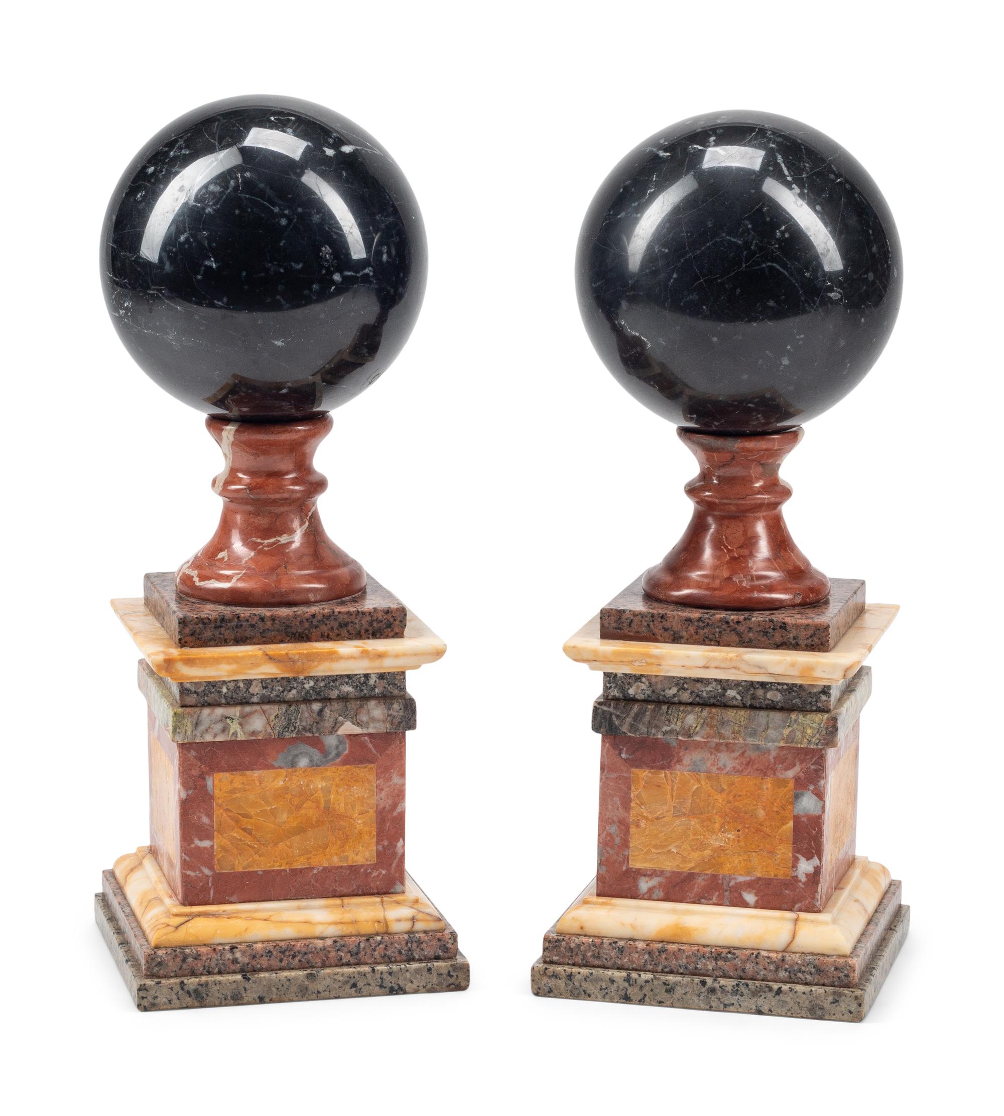 A Pair of Grand Tour Style Vari-Color Marble Ornaments