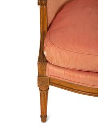 A Louis XVI Carved Walnut Bergère