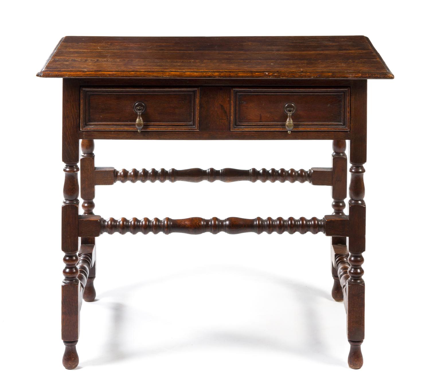 A Charles II Style Oak Side Table Height 28 x width 34 1/2 x depth 23 inches.