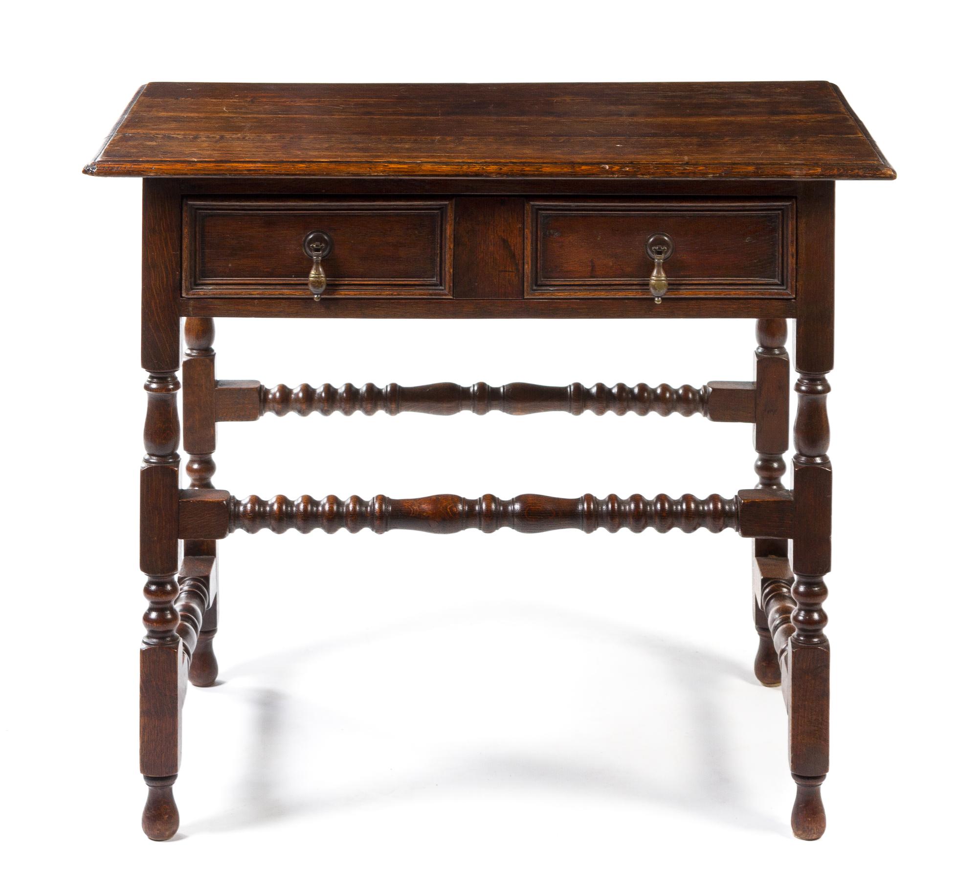 A Charles II Style Oak Side Table Height 28 x width 34 1/2 x depth 23 inches.