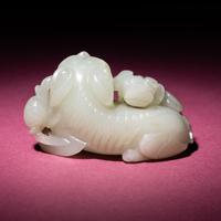 A Chinese Pale Celadon Jade Group of Fu Lions, Qing Dynasty — 清 青白玉太獅少獅把件