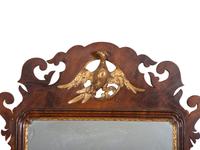 A George III Style Parcel Gilt Mahogany Mirror