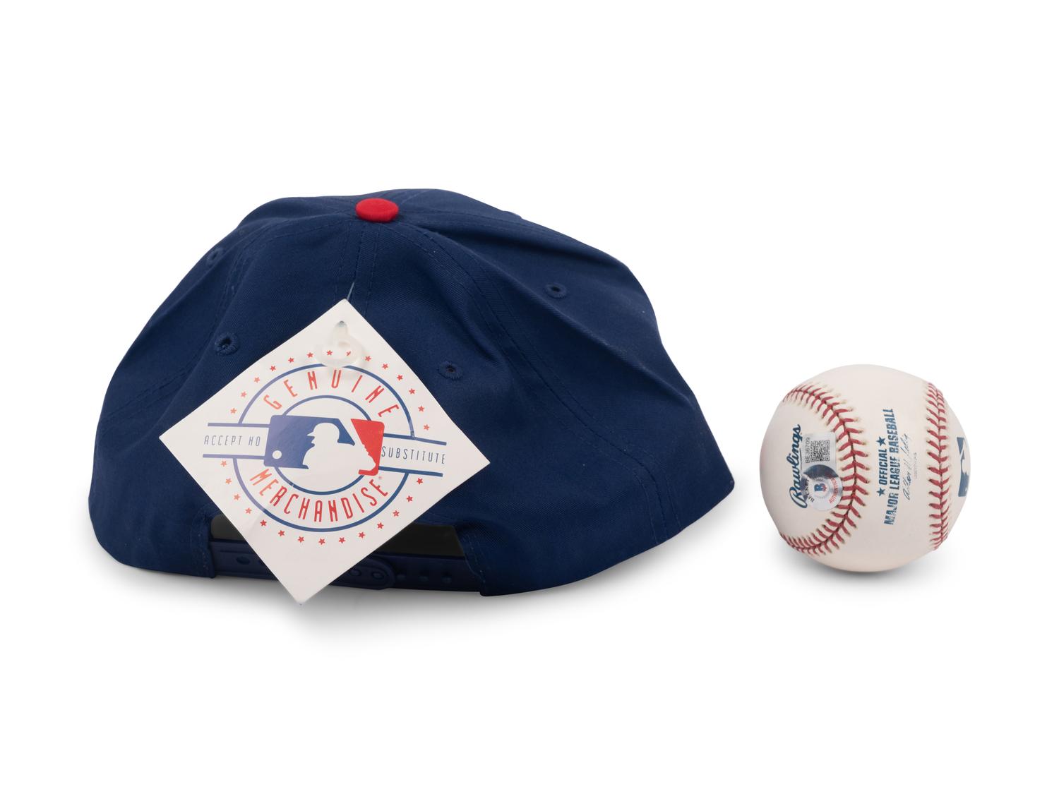 A Greg Maddux Signed Baseball and Chicago Cubs Hat (Beckett Authentication Services BAS Certified),