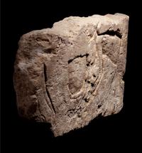 An Egyptian Limestone Relief Fragment