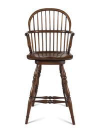An Assembled Set of Nine Yew, Elm and Beechwood Windsor Armchairs