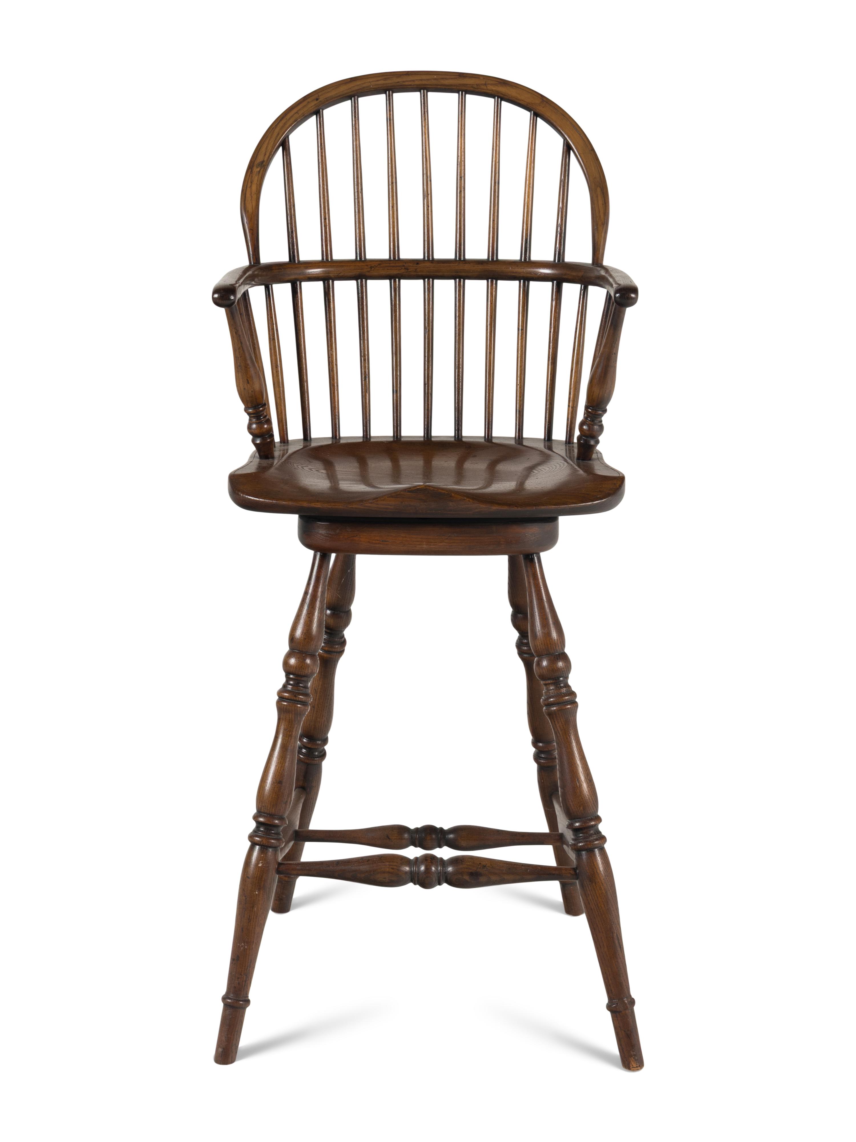 An Assembled Set of Nine Yew, Elm and Beechwood Windsor Armchairs