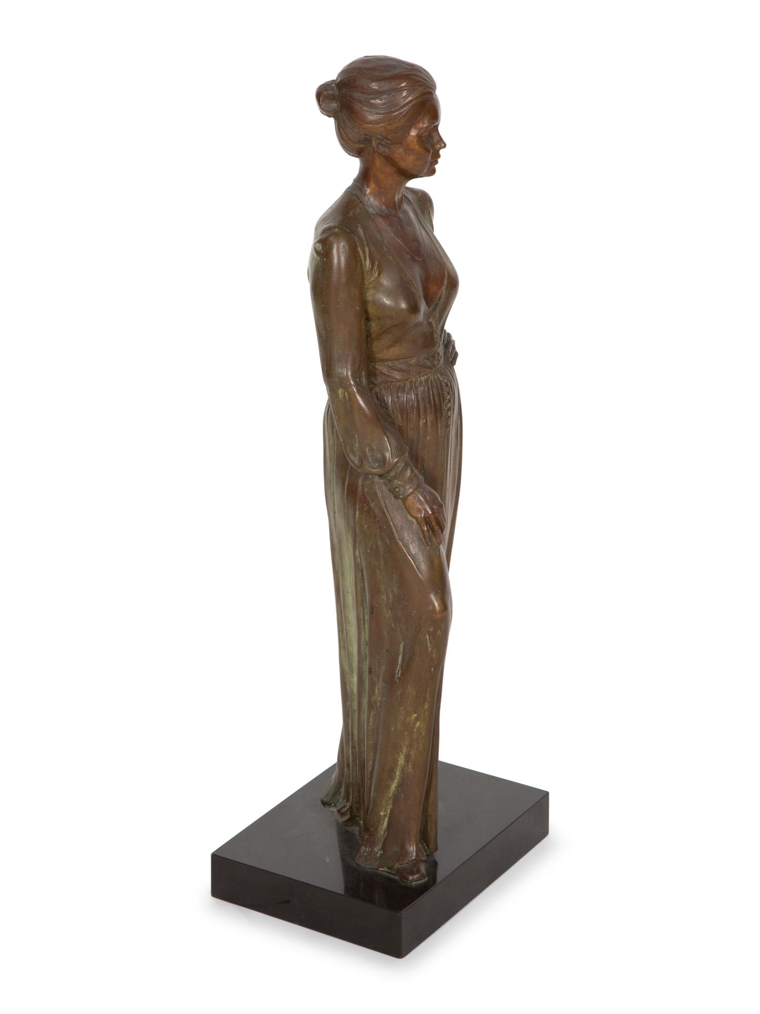 A Bronze Sculpture of a Standing Woman