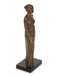 A Bronze Sculpture of a Standing Woman
