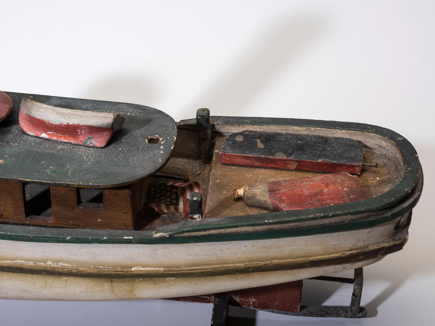 A Painted Wood Model of the Tugboat Maggie