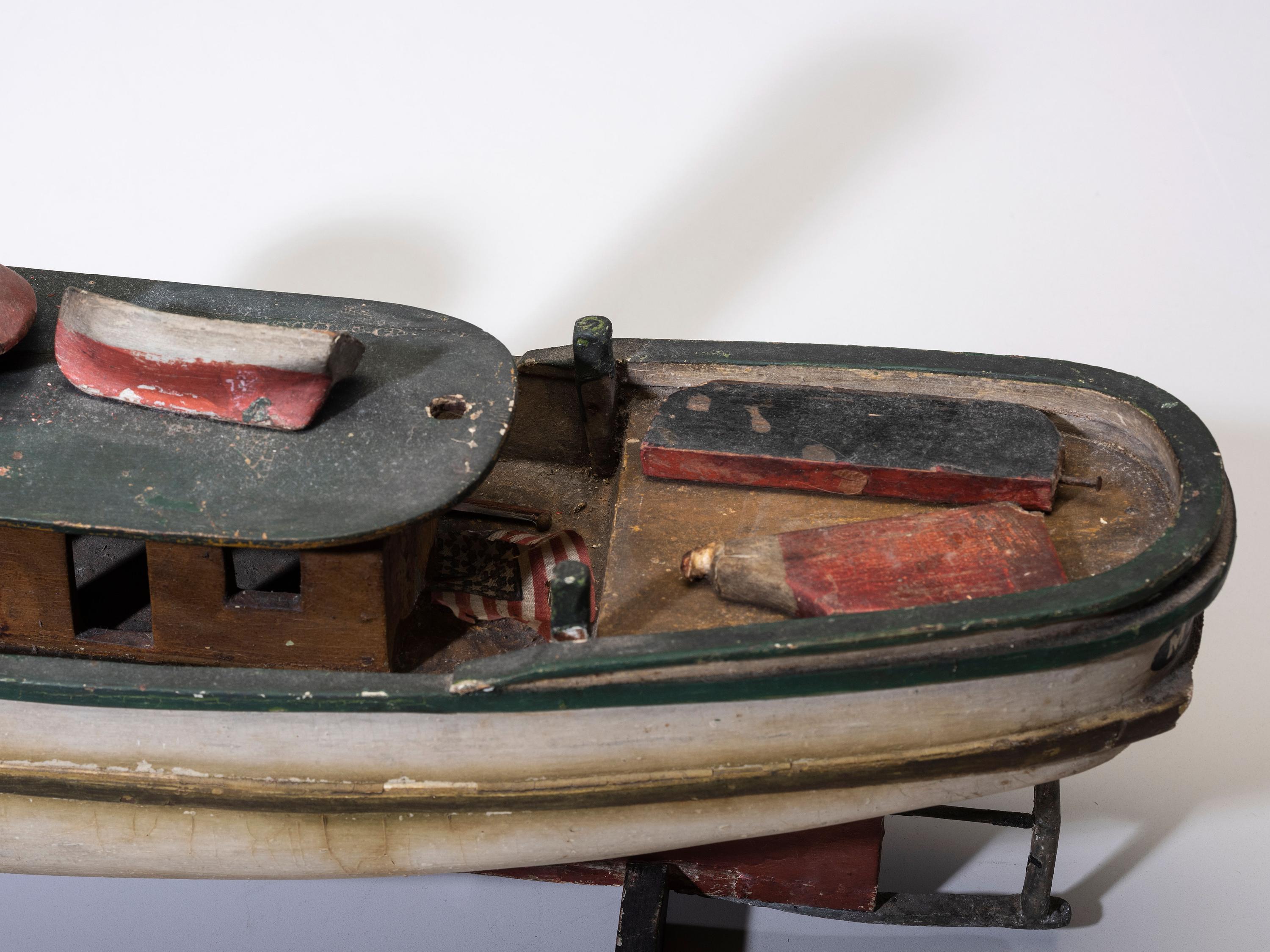 A Painted Wood Model of the Tugboat Maggie