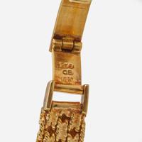 An 18K Yellow Gold Bucherer Ladies Watch