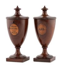 A Pair of George III Mahogany Alms Urns