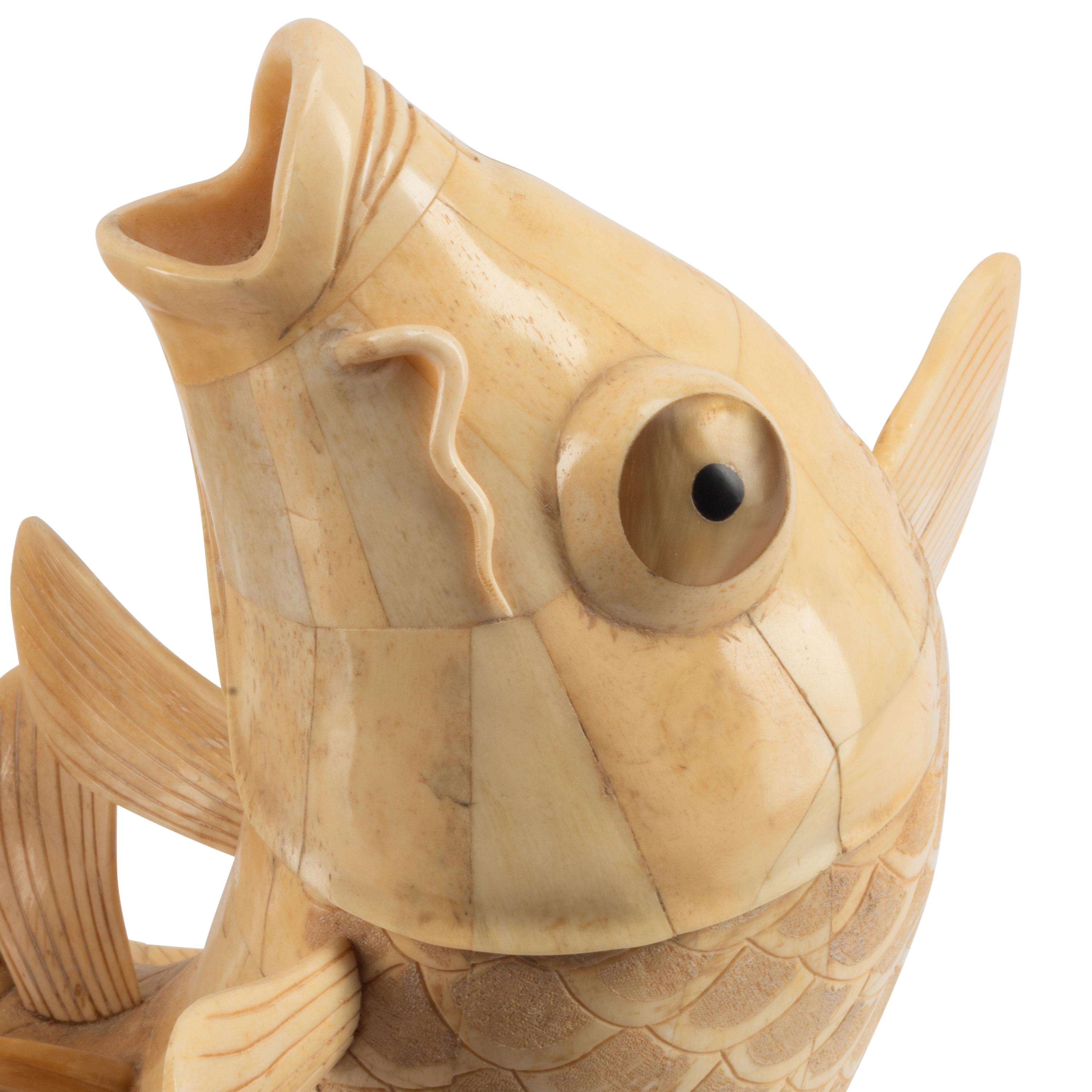 A Pair of Japanese Bone-Veneered Fish Sculptures