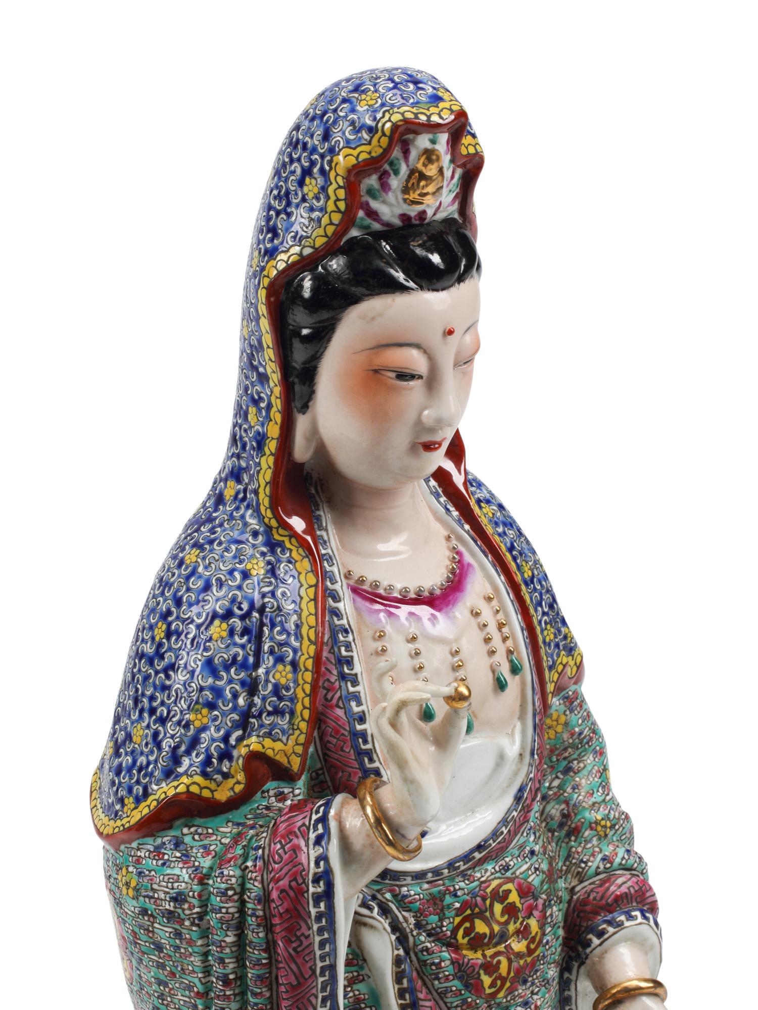 A Chinese Enameled Porcelain Figure of Guanyin