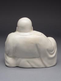 A Blanc-de-Chine Porcelain Figure of Budhai Buddha
