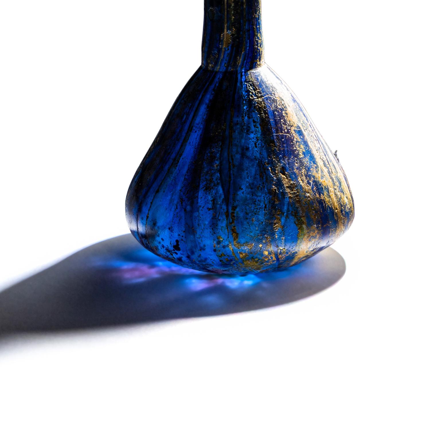A Roman Marbled Glass Unguentarium