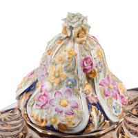 A Pair of Sèvres Style Porcelain Potpourri Vases and Covers
