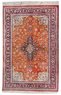 A Persian Silk and Wool Rug 4 feet 10 inches x 3 feet 4 inches. — 20TH CENTURY