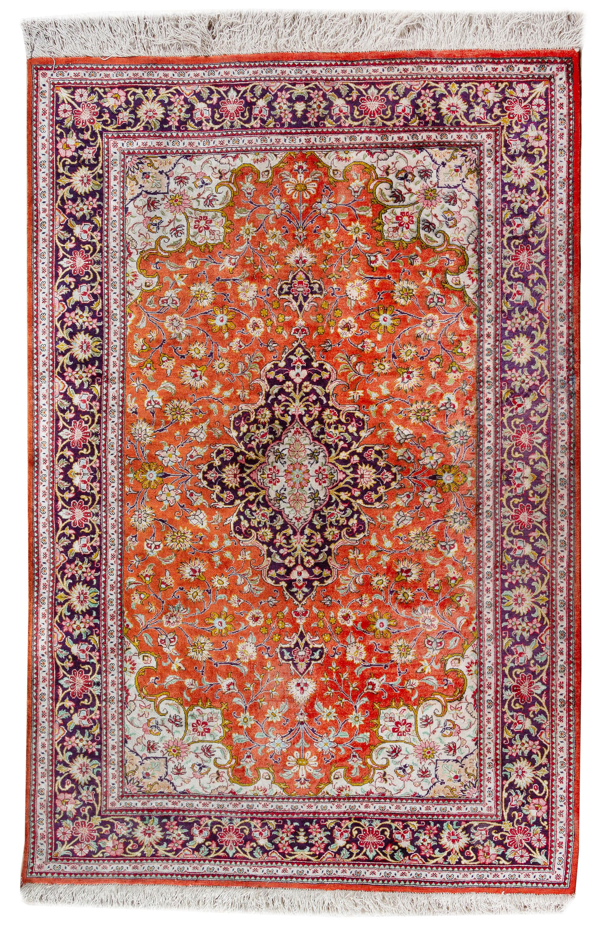 A Persian Silk and Wool Rug 4 feet 10 inches x 3 feet 4 inches. — 20TH CENTURY