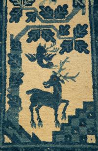 A Group of Three Chinese Rugs