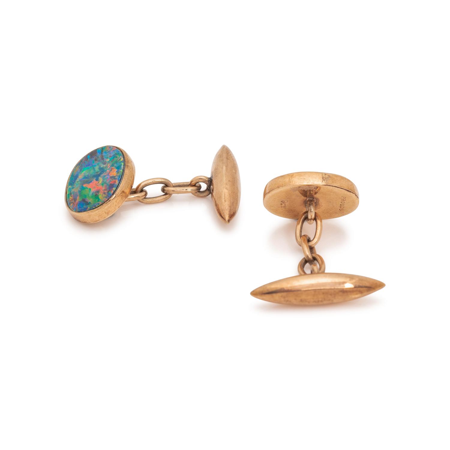 PROUDS, YELLOW GOLD AND BLACK OPAL CUFFLINKS