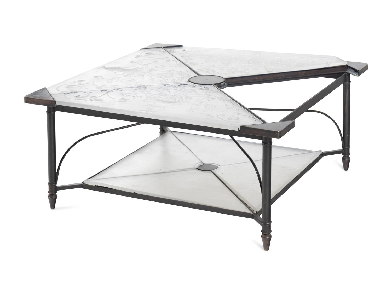An Etched Glass-Top Patinated Metal Cocktail Table