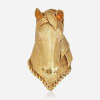 An 18K Yellow Gold Horse Pendant