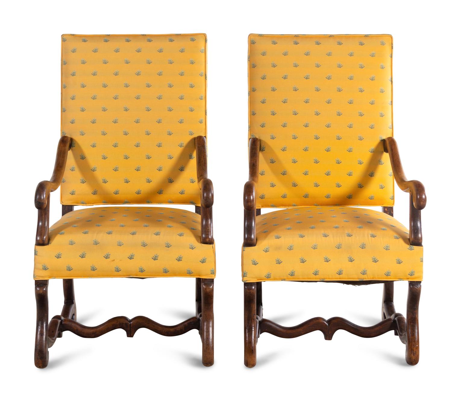 A Pair of Louis XIV Walnut Armchairs