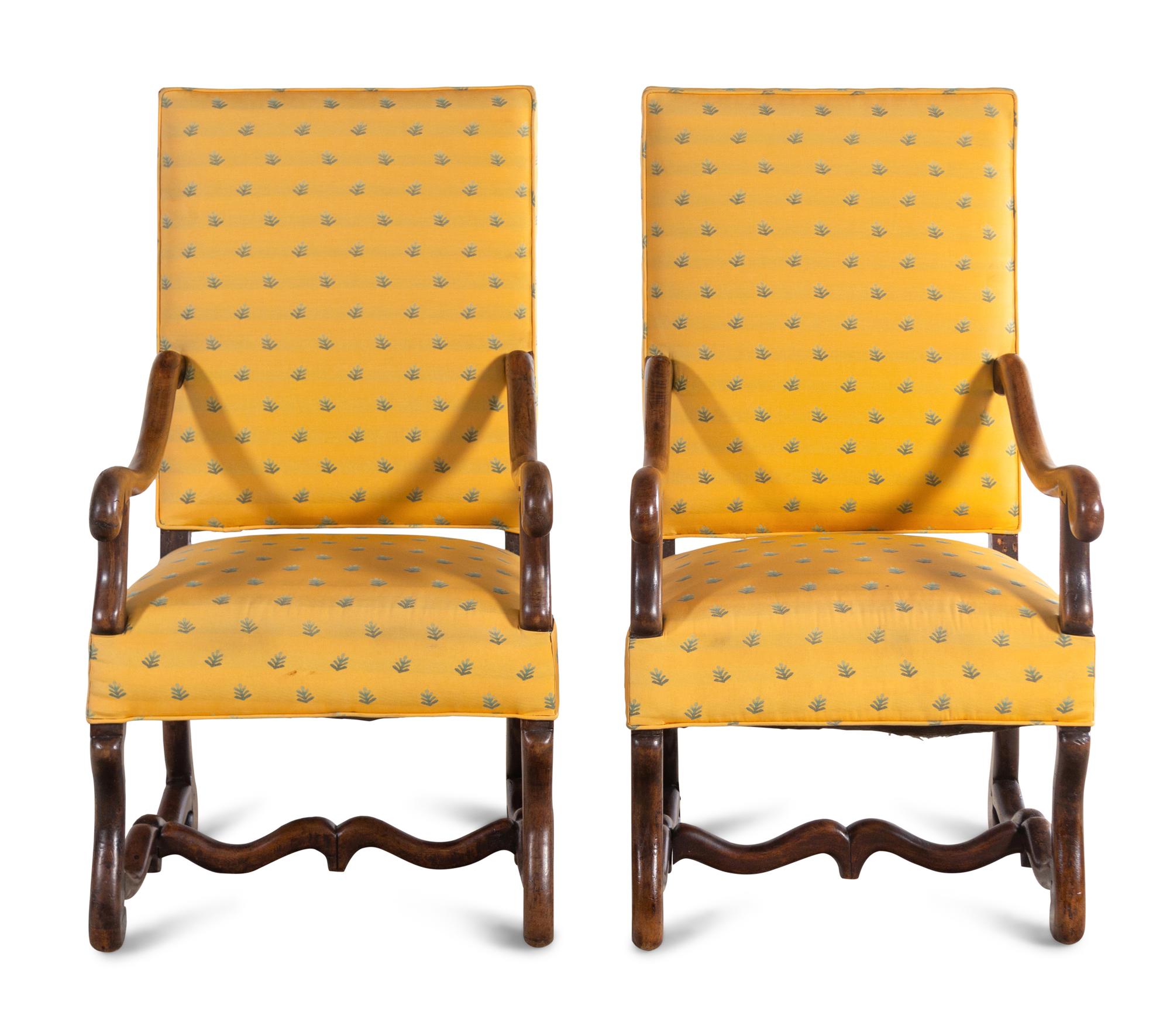 A Pair of Louis XIV Walnut Armchairs