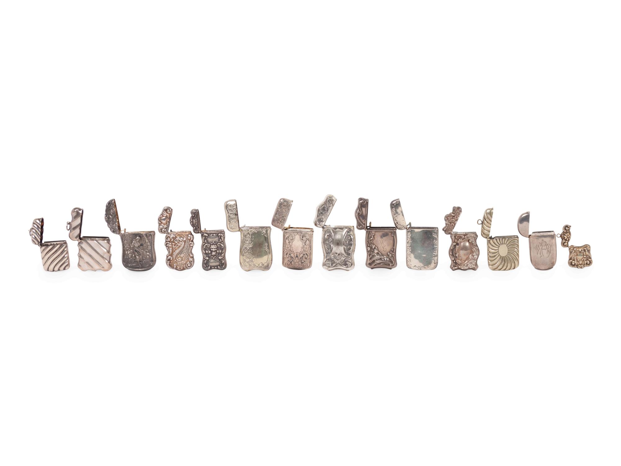 A Group of Fourteen Silver Match Safes