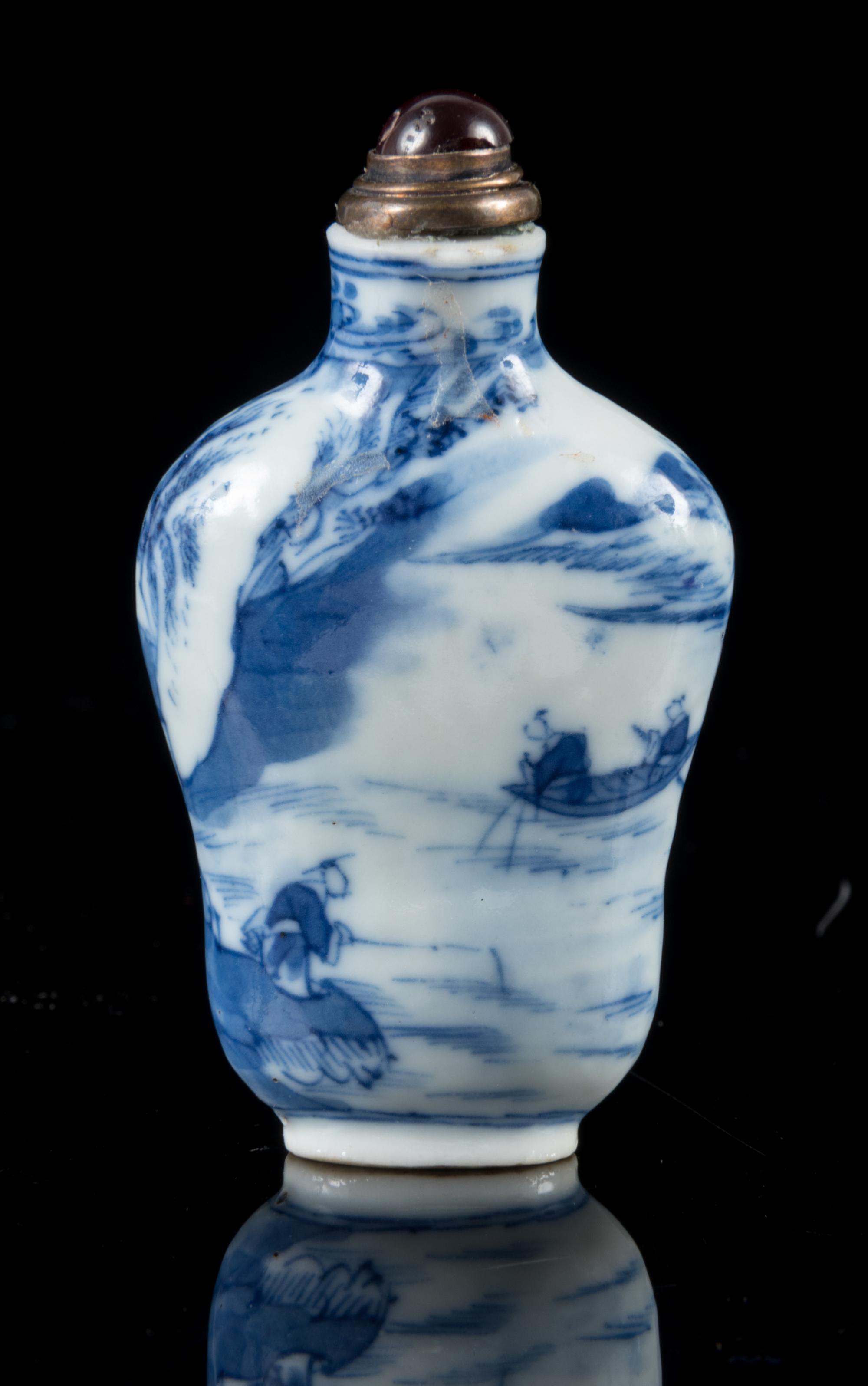 A Blue ane White Porcelain Snuff Bottle Height 2 1/2 inches. — GUANGXU PERIOD (1875-1908)