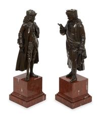 A Pair of Bronze Sculptures of Voltaire and Rousseau