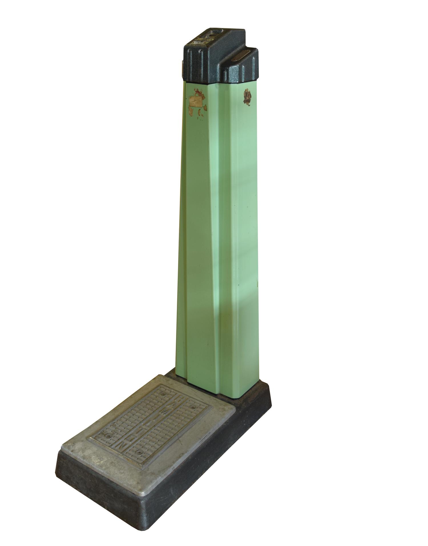 An Art Deco Stand-Up Scale 11" W x 21.5" D x 40.5" H — United States, Circa 1920