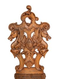 A Pair of Italian Carved Walnut Sgabello Chairs